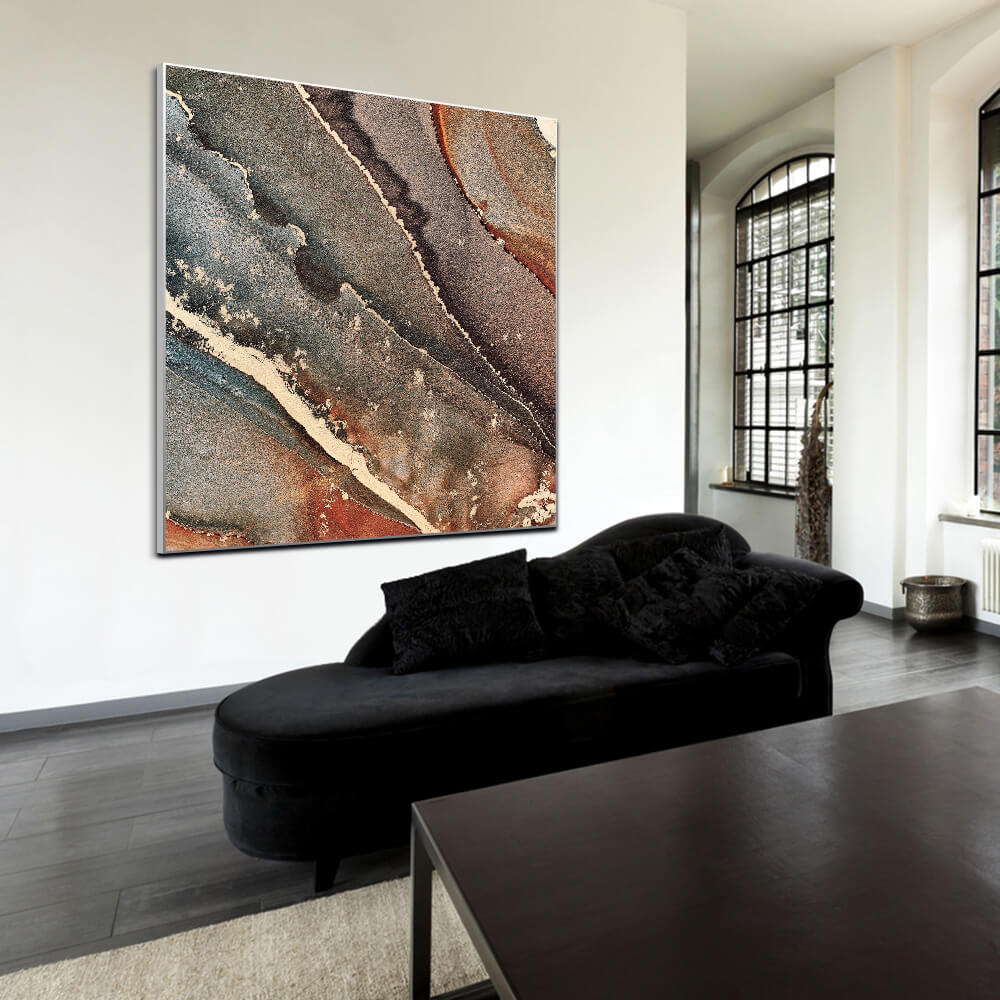 Quadratisches Akustikbild in kuper-braun-grau marmorierter Optik in einem Wohnzimmer